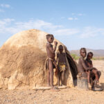 Ovahimba children sitting outside their home (image by Inger Vandyke)