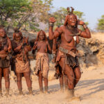 Ovahimba women dancing in a riverbed at sunset (image by Inger Vandyke)
