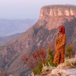 Mountain Ovamwila girl at Tundavala on sunset (image by Inger Vandyke)