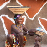 An Ovandimba woman playing with her infant (image by Inger Vandyke)