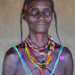 An elderly Ovangambwe woman at a remote market in southern Angola (image by Inger Vandyke)