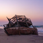 Shipwreck at sunset in southern Angola (image by Inger Vandyke)