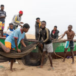 Smiling fisherman at Tombua in Southern Angola (image by Inger Vandyke)