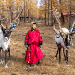 Tsaatan children are raised with their reindeer from birth (image by Inger Vandyke)