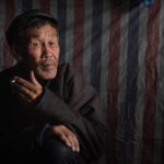 Portrait of a Tsaatan man in his winter home (image by Inger Vandyke)