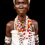 Portrait of a Vodunsi woman. It is tradition that future voodoo brides wear white and cover themselves in kaolin powder to feed the spirit (image by Ingrid Koedood)