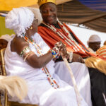 King Agassa shares a joyful moment with his mother at the Voodoo festival (image by Ingrid Koedood)