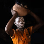 Preparations for the voodoo include kaolin covered dancers twirling the streets carrying burning bark and incense (image by Ingrid Koedood)