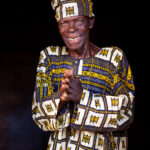 A smiling Zangbeto priest welcomes us to his village and ceremony (image by Ingrid Koedood)