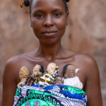 A twins priestess carrying five 'babies' (image by Ingrid Koedood)