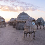 Wandering through a pretty Jie village at sunset (image by Inger Vandyke)