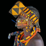 Jie woman with piercings, beaded jewellery and the 'guineafowl' scarification. The latter tradition is dying out in favour of other forms of body decoration (image by Inger Vandyke)