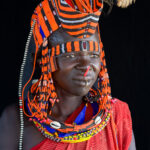 Beautifully decorated Jie woman (image by Inger Vandyke)