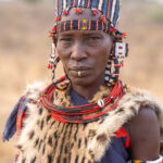 Elderly Jie woman with her Serval skin dress (image by Inger Vandyke)