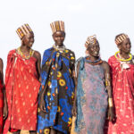 Jie women enjoying a ceremony (image by Inger Vandyke)