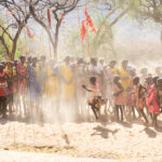 Laarim women dancing in the dust of the Kimotong Mountains (image by Inger Vandyke)