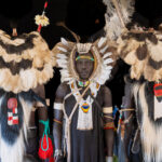 The stunning decoration of Lopit warriors includes Ostrich feathers and the skins of Colobus Monkeys (image by Inger Vandyke)
