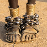 The decorated ankles of a Toposa woman at a dance (image by Inger Vandyke)