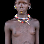 Scarification of Toposa women begins when they are young girls (image by Inger Vandyke)