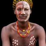 A portrait of an Arbore man with his face painted, a traditional practice for a wedding (image by Ingrid Koedood)