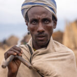 An Arbore man posing with his stick on his shoulder (image by Ingrid Koedood)