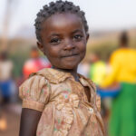 A portrait of a young Ari girl in front of the Yetbebersh market (image by Ingrid Koedood)