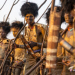 Dassanech men dressed in their traditional costumes for the Dimi ceremony. (image by Ingrid Koedood)