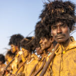 Decorated Dassanech men covered in skins and yellow ochre to celebrate Dimi, the Dassanech initation ceremony for girls (image by Ingrid Koedood)