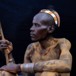 A Dassanech man with a unique hairstyle, showcasing the distinctive hair and adornments typical for this tribe (image by Ingrid Koedood)