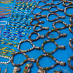 Hamer souvenirs at the Turmi market. Hamer woman wear thick copper necklaces announcing their marital status (image by Ingrid Koedood)