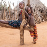 Two young Hamer children posing in their village (image by Ingrid Koedood)