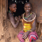 Two young Hamer girls giggle as I capture their photo (image by Ingrid Koedood)