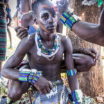 During the Hamer ceremony the Maza (the whipper) is painted and adorned with body markings to prepare for his role in the event (image by Ingrid Koedood)