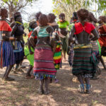 Hamer women singing and dancing in a circle during the bull jumping ceremony (image by Ingrid Koedood)