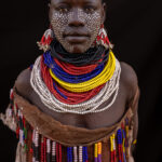 A portrait of a young Karo woman with a painted face (image by Ingrid Koedood)