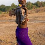 A portrait of a Karo herder, gazing at the herd of goats and sheep (image by Ingrid Koedood)