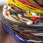 Nyangatom women wear strings of brightly colored beads around their neck (image by Ingrid Koedood)