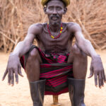 A Nyangatom man with scarification on his chest and arms, marking his bravery. These scars signify that he has killed a wild animal or a member of a rival tribe (image by Ingrid Koedood)
