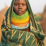 A beautiful Nyangatom woman with beads around her neck (image by Ingrid Koedood)