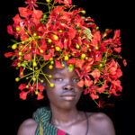 In Kibish town we met young Suri women adorned with flowers (image by Ingrid Koedood)