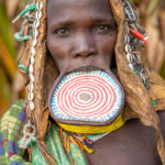 A Suri woman with a lip plate. Suri girls are adorned with a lip plug from their midteens (image by Ingrid Koedood)