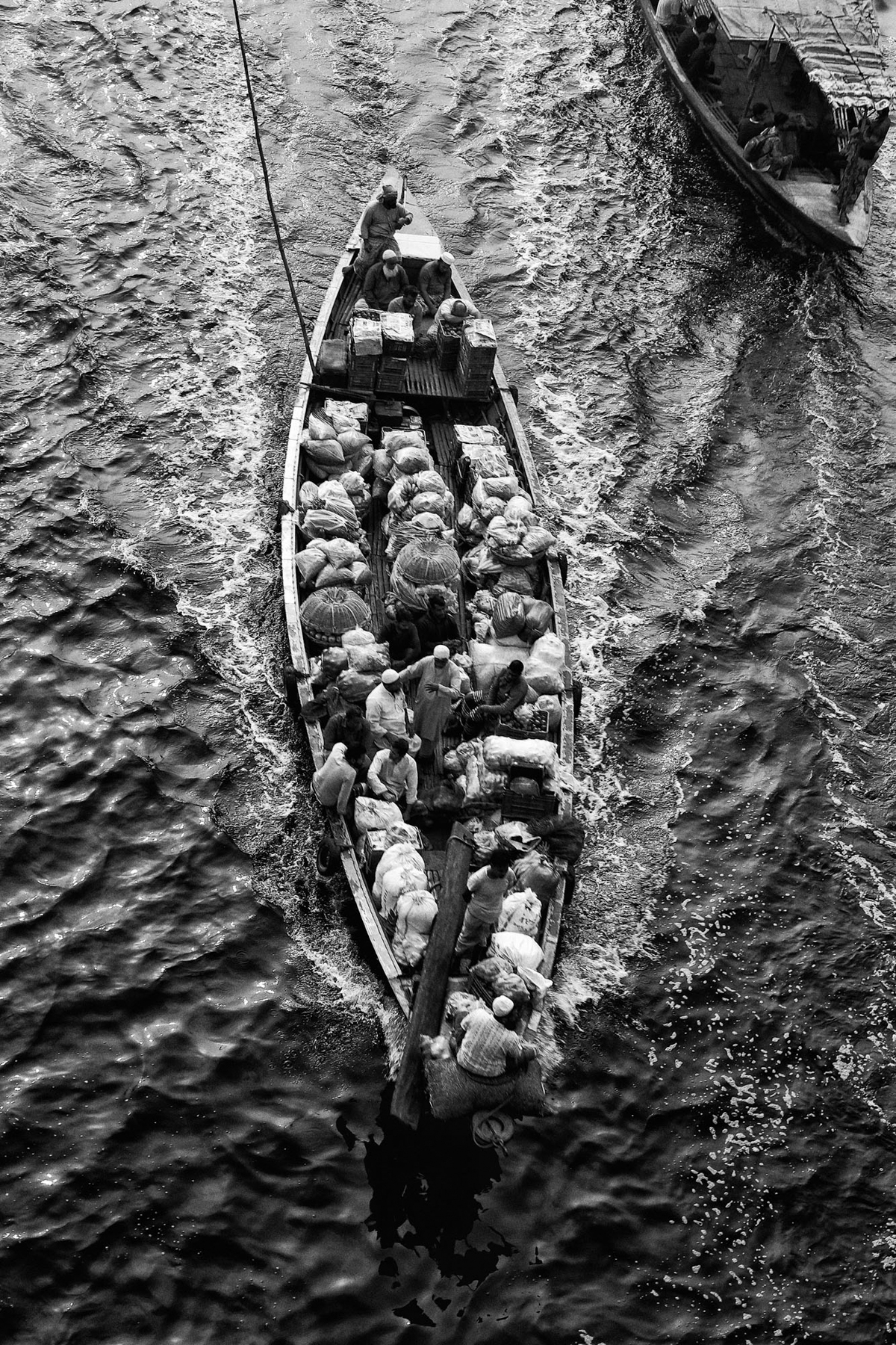 Buriganga cargo boat in black and white (image by Yousuf Tushar)