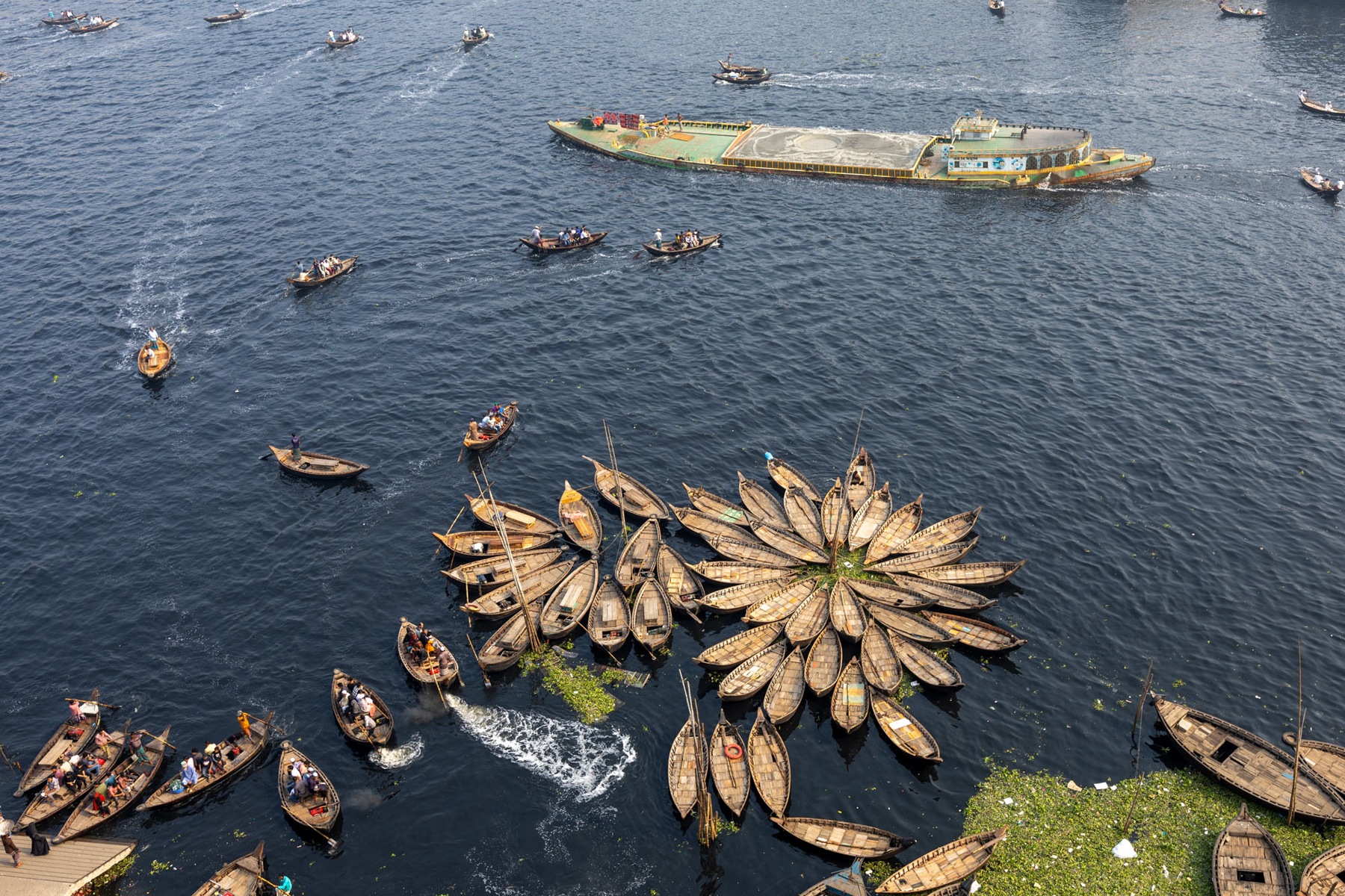 The lotus flower shaped moorings of tiny wooden taxi boats on the Buriganga (image by Yousuf Tushar)