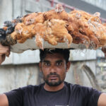 Selling chickens in Dhaka (image by Yousuf Tushar)