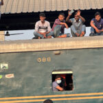 Riding on the roofs of trains (image by Yousuf Tushar)