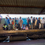 Lines of commuters pack a local train in Dhaka (image by Yousuf Tushar)
