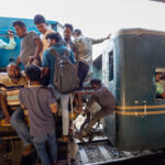 Rush hour in a crowded train station of Dhaka (image by Yousuf Tushar)