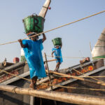 Fish carriers offloading fish from local trawlers (image by Yousuf Tushar)