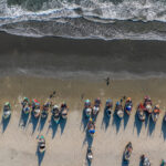 Lines of moon boats on the beach (image by Yousuf Tushar)