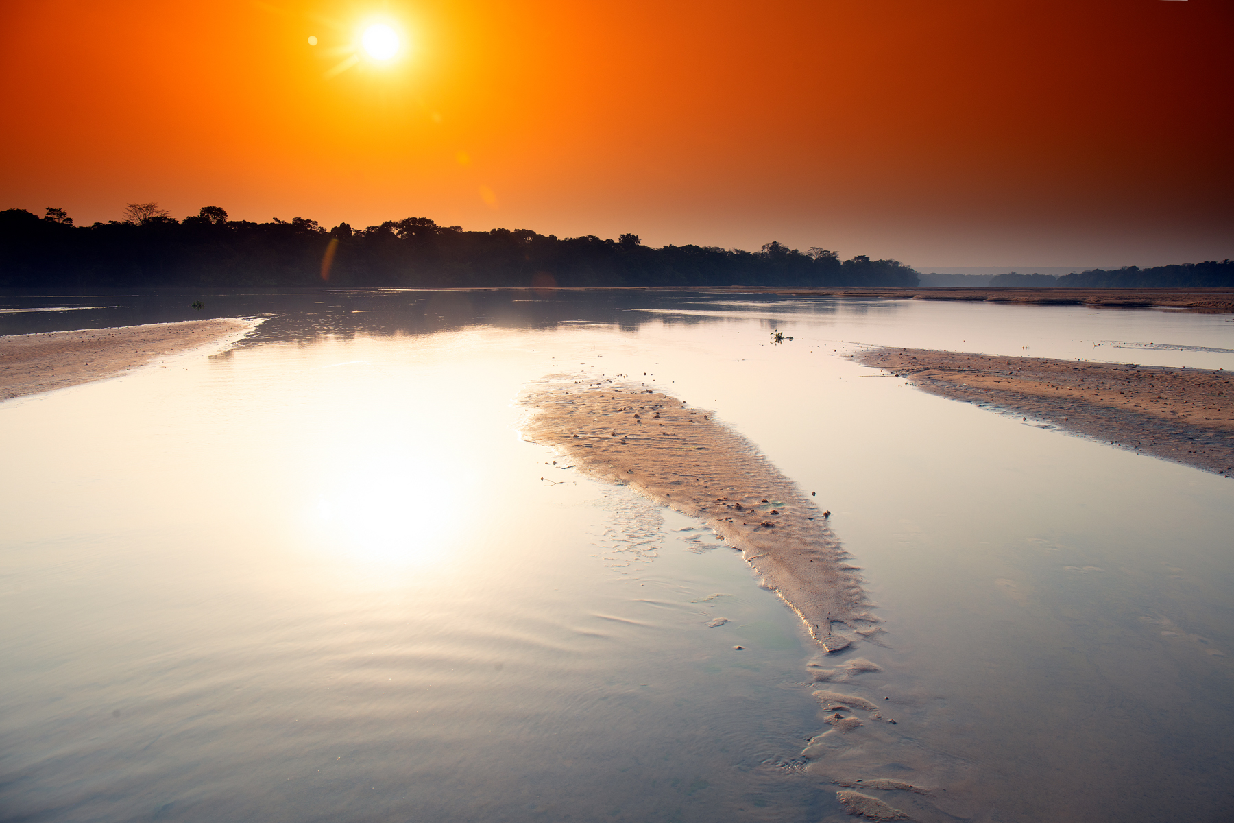 Sun settting on the River Dzanga in the hear of the Dzanga Sangha National Park.